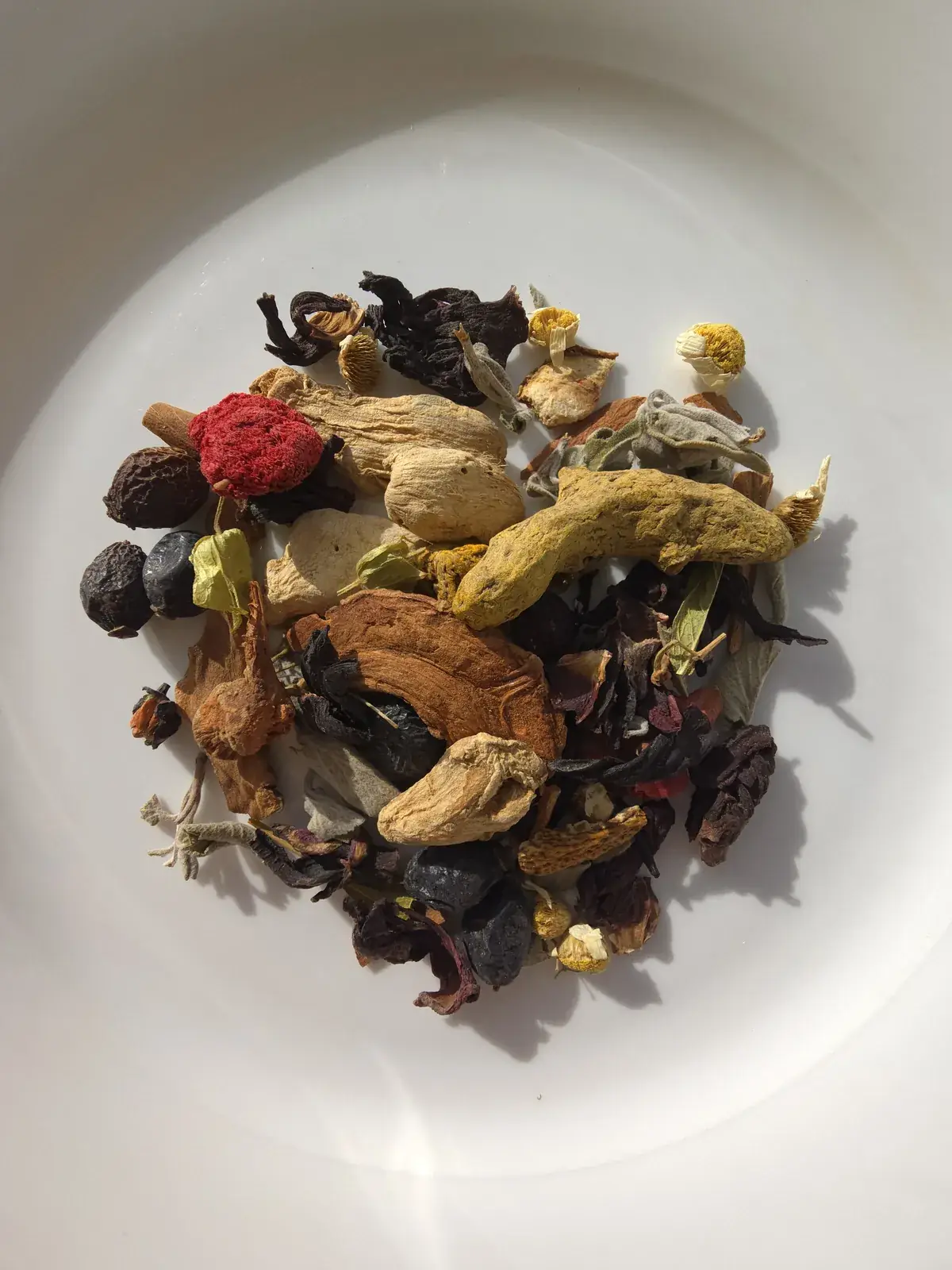 Ginger Turmeric Tea loose leaf blend: ginger, turmeric, hibiscus, chamomile and other herbs and spices