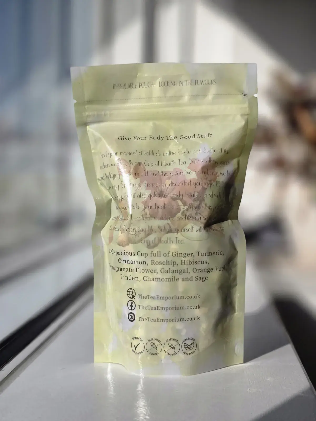 Back of the Ginger Turmeric Tea pouch with the blend description and ingredients